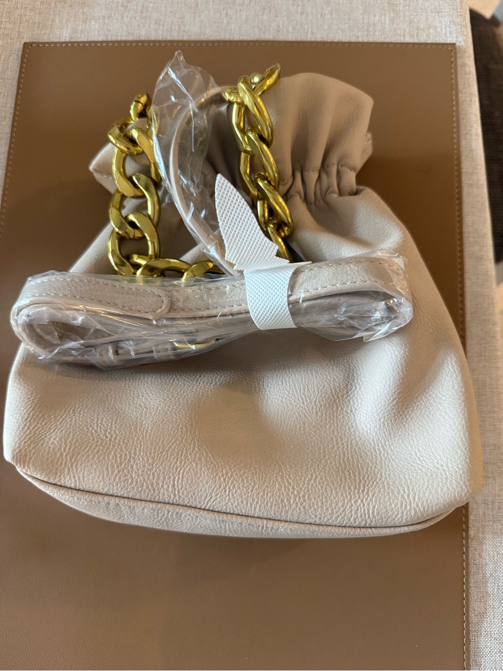 Street Level Revolve Soft Cream Leather Drawstring Bag with Gold Chain